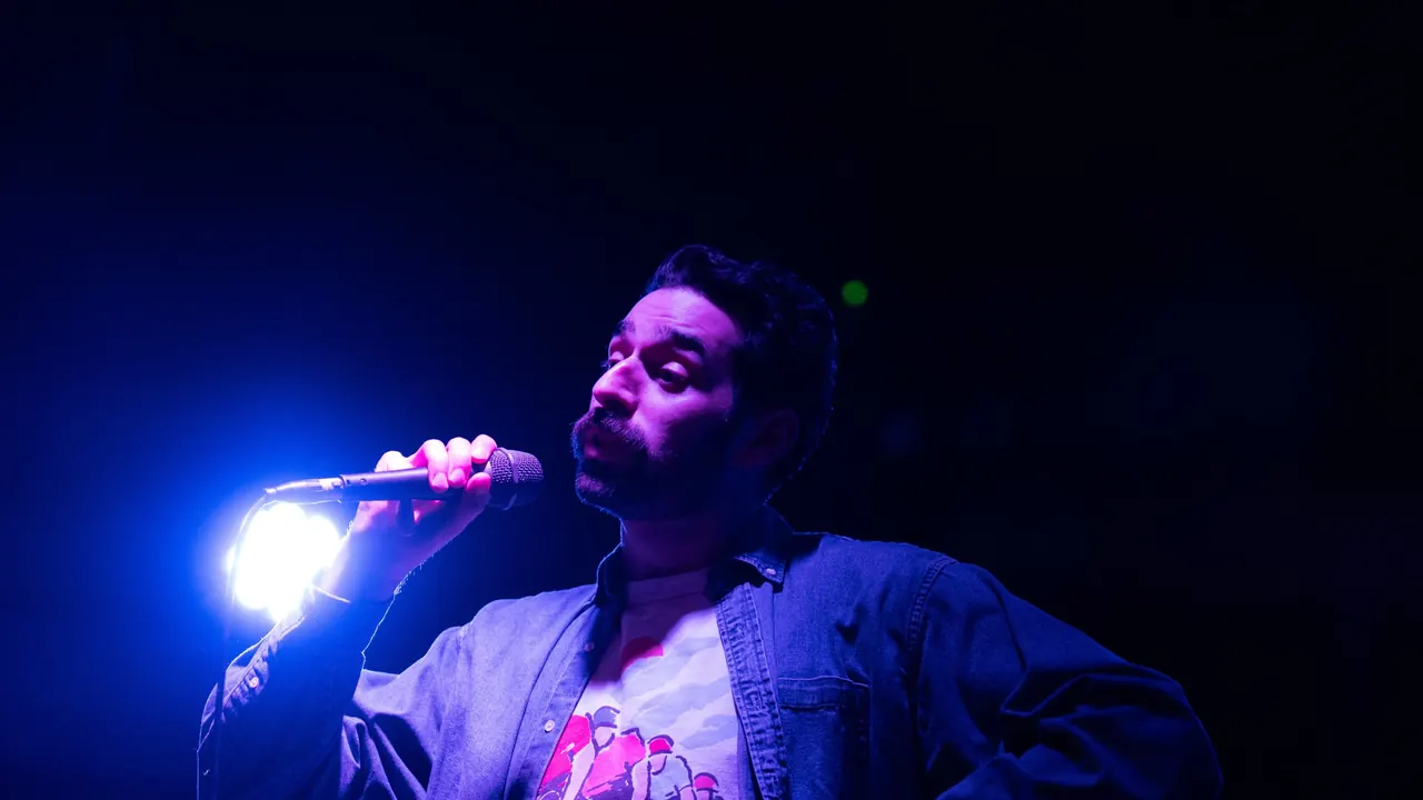 Sneer performing live on stage
